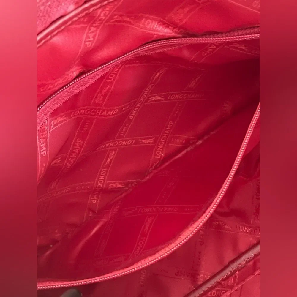 Vintage Longchamp Roseau Leather Bag in the color Bordeaux.